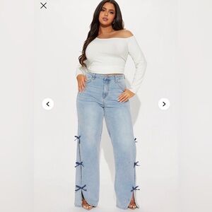 Fashion Nova Light Blue Flare Jeans with Bow Accents